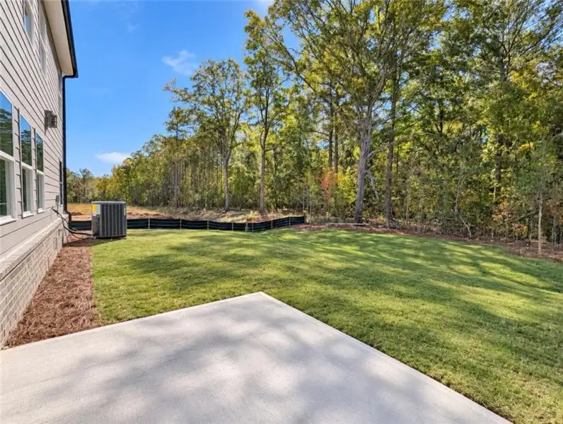 Exterior details and patio area of a home in Kingsmere Estates, Loganville (Image 4).