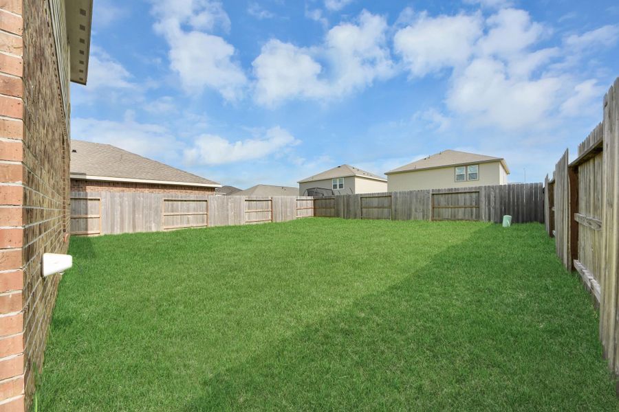 Spacious yard ready for outdoor living.