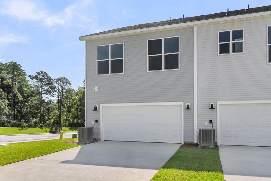 Exterior details and patio area of a home in Six Oaks, Summerville (Image 4).