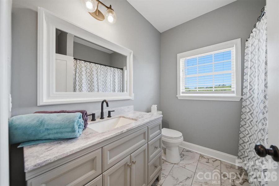Furnished interior view inside a new home in , Lenoir (Image 15).