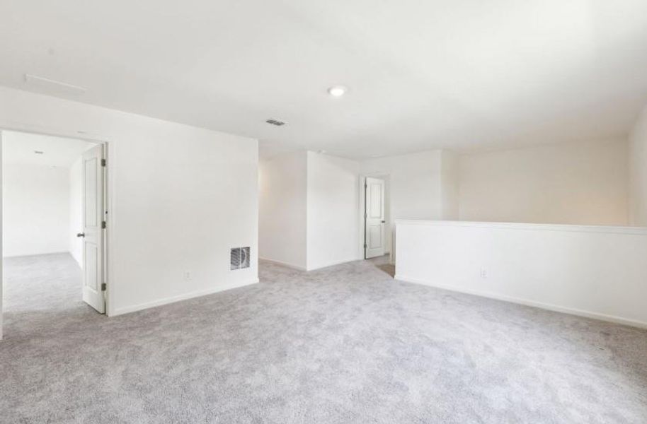 Spacious, unfurnished interior of a new home in Sunterra Lakes, Brookshire (Image 15).