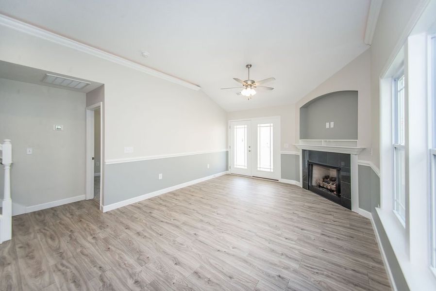 Representative unfurnished interior of a home built from the Quincy by Enchanted Homes in Hampshire Heights, Moore (Image 32).