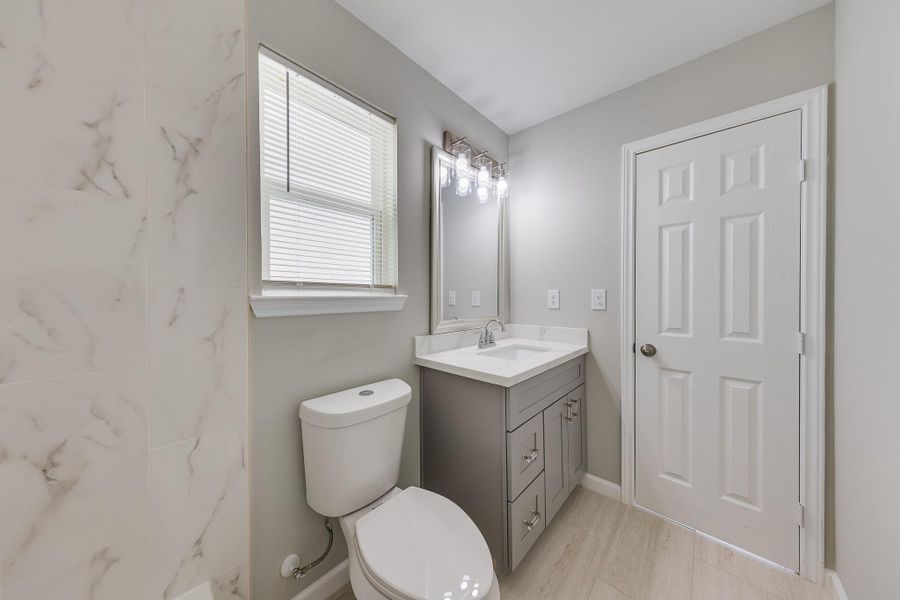 With ample storage options below, you can easily keep all your essentials organized and within reach, ensuring a clutter-free and serene environment.