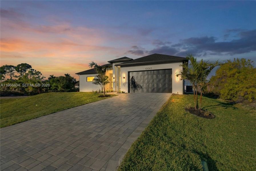 Front exterior of a new home in , Port Charlotte, FL, highlighting curb appeal (Image 25).