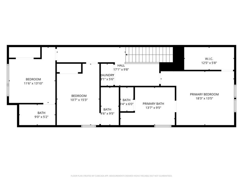 This floor plan features a spacious primary bedroom with an en-suite bath and walk-in closet, two additional bedrooms, two more bathrooms, and a laundry area. The layout includes a central hall and staircase, providing easy access throughout.