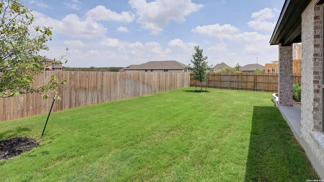 Exterior details and patio area of a home in Alsatian Oaks, Castroville (Image 23).