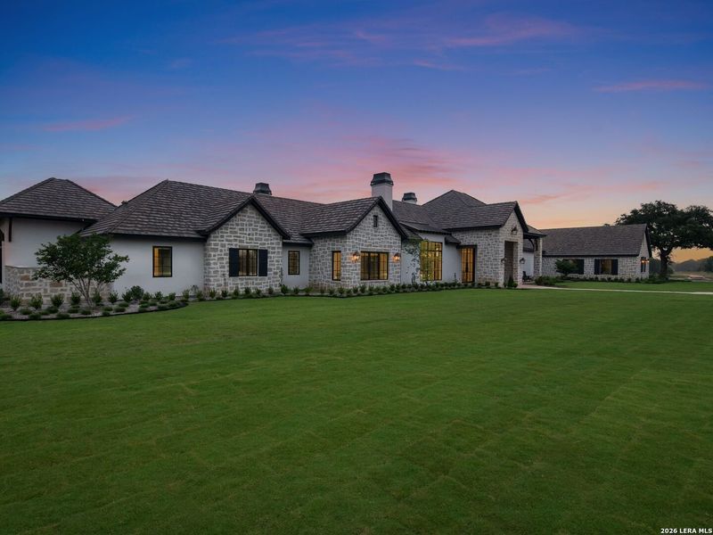 Front exterior of a new home in , Boerne, TX, highlighting curb appeal (Image 2).