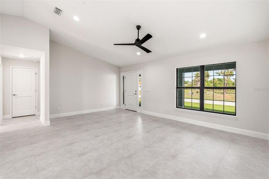 Spacious, unfurnished interior of a new home in , Port Charlotte (Image 37).