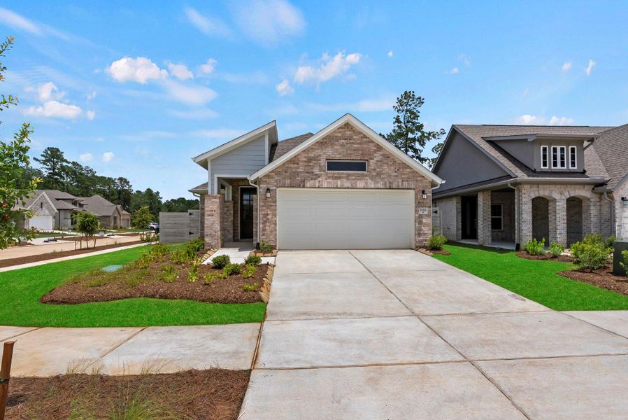 Front exterior of a new home in Two Step Farm, Montgomery, TX, highlighting curb appeal (Image 1). Front exterior of a new home in Two Step Farm, Montgomery, TX, highlighting curb appeal (Image 1).