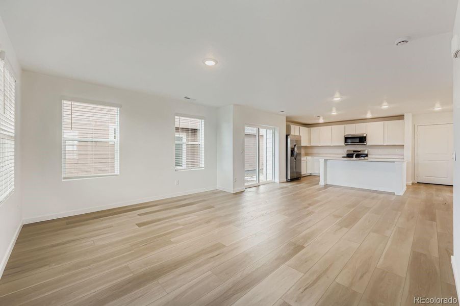 Spacious, unfurnished interior of a new home in Percheron: The Explorer Collection, Colorado Springs (Image 6).