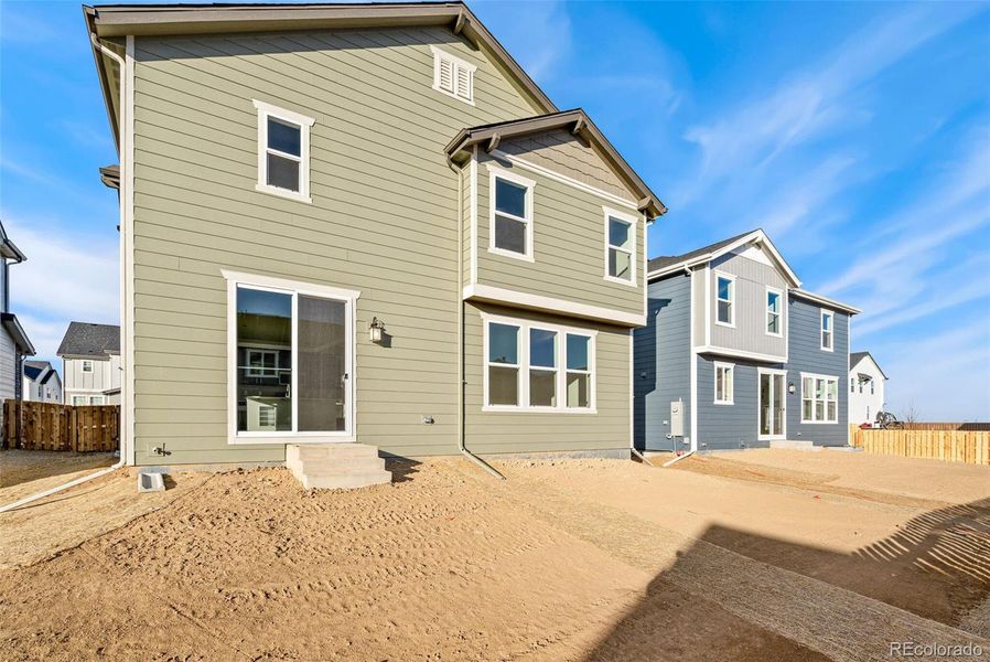 Exterior details and patio area of a home in Turnberry, Commerce City (Image 4).