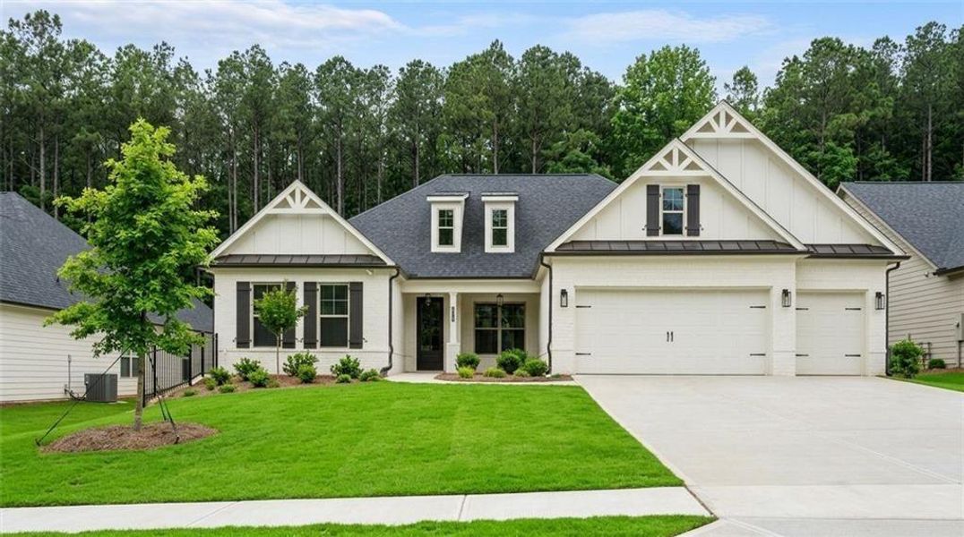 Front exterior of a new home in Soleil Belmont Park, Canton, GA, highlighting curb appeal (Image 1). Front exterior of a new home in Soleil Belmont Park, Canton, GA, highlighting curb appeal (Image 1).