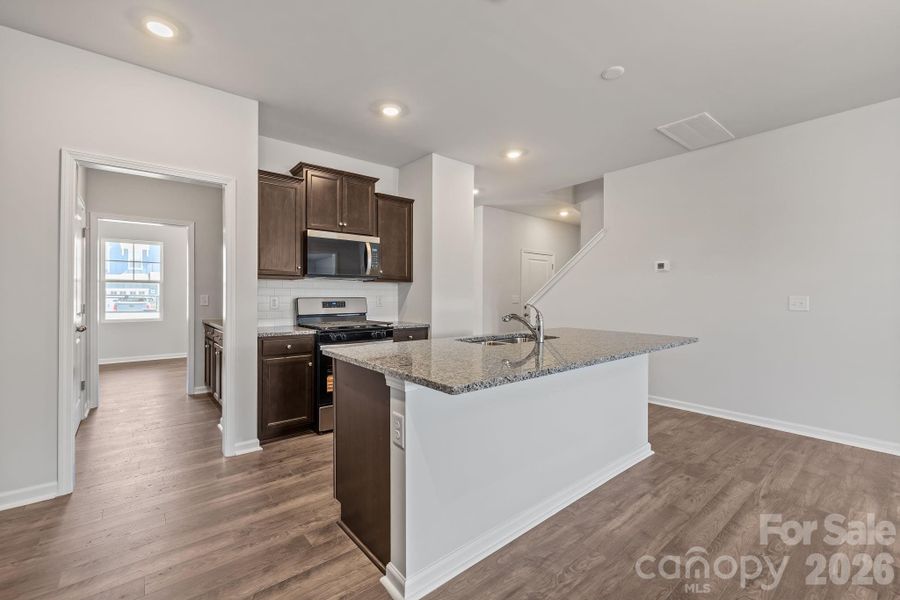 Furnished interior view inside a new home in McFarland Estates, York (Image 8).