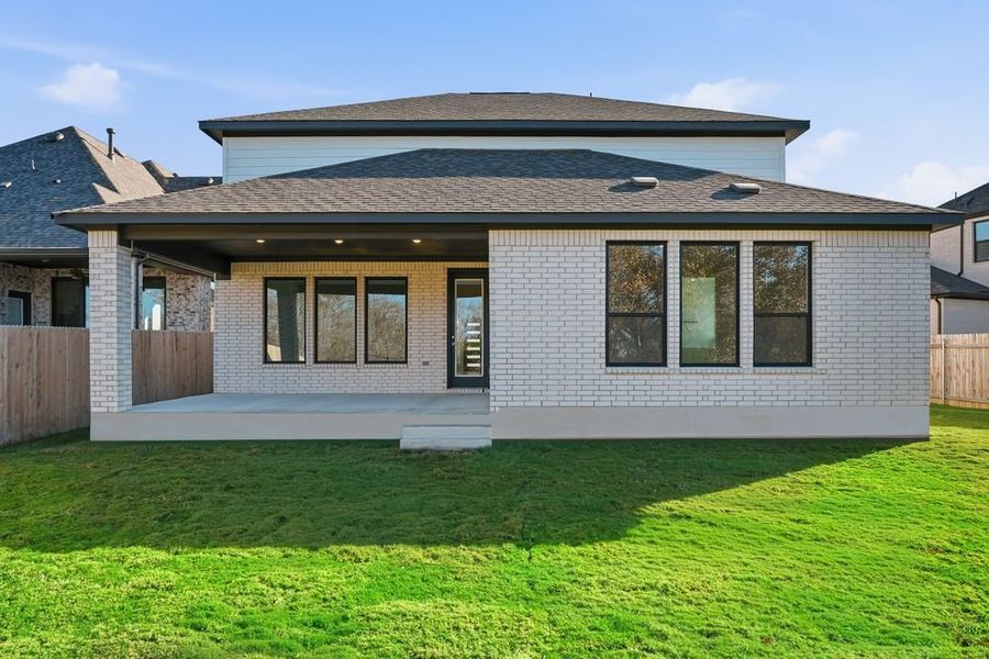 Exterior details and patio area of a home in Santa Rita Ranch, Liberty Hill (Image 3).