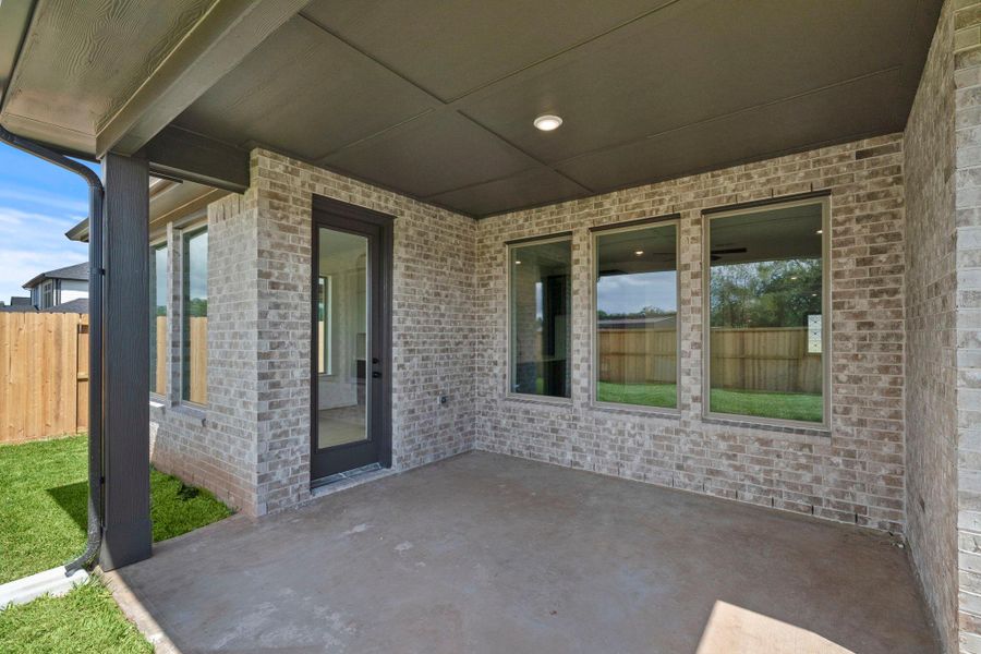 Exterior details and patio area of a home in Sienna 45', 50', Missouri City (Image 3). Exterior details and patio area of a home in Sienna 45', 50', Missouri City (Image 3).