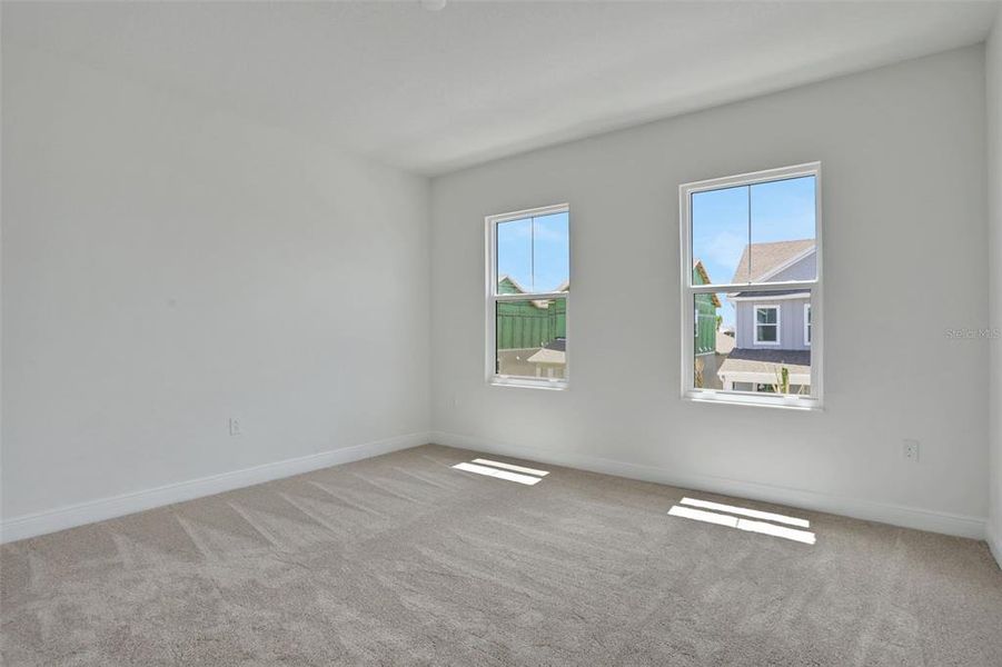 Spacious, unfurnished interior of a new home in Bungalow Walk at Lakewood Ranch, Sarasota (Image 24).