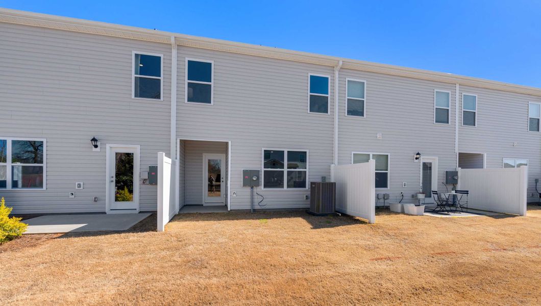 Exterior details and patio area of a home in Covington Village, Greer (Image 24).