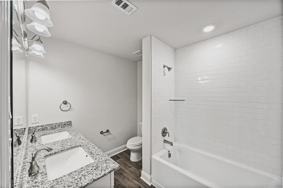 Furnished interior view inside a new home in Stonebrooke, Conroe (Image 7).