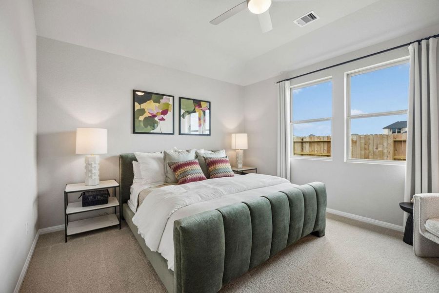 Primary Bedroom in the Oak home plan by Trophy Signature Homes – REPRESENTATIVE PHOTO