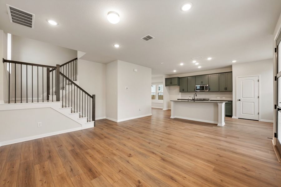 Representative unfurnished interior of a home built from the Robin by Ashton Woods in The Cottages at Lariat, Liberty Hill (Image 21). Representative unfurnished interior of a home built from the Robin by Ashton Woods in The Cottages at Lariat, Liberty Hill (Image 21).