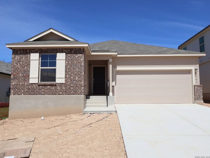 Front exterior of a new home in Agave, San Antonio, TX, highlighting curb appeal (Image 2). Front exterior of a new home in Agave, San Antonio, TX, highlighting curb appeal (Image 2).
