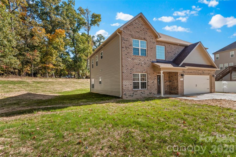 Front exterior of a new home in , Winston-Salem, NC, highlighting curb appeal (Image 23).