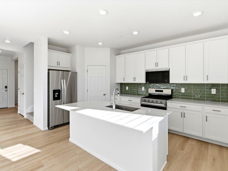 Furnished interior view inside a new home in Buffalo Highlands: The Flora Collection, Commerce City (Image 9).