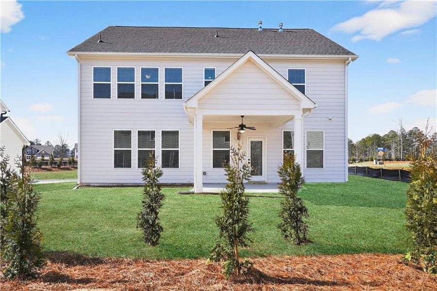 Exterior details and patio area of a home in The Fairways at Mirror Lake, Villa Rica (Image 29).