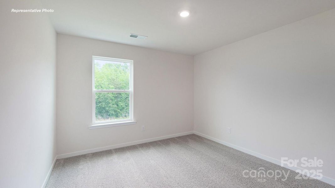 Spacious, unfurnished interior of a new home in Reedy Creek Preserve, Charlotte (Image 23).