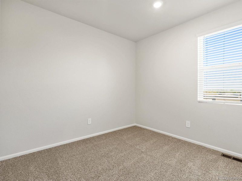 Spacious, unfurnished interior of a new home in Poudre Heights: The Lakes Collection, Windsor (Image 21).