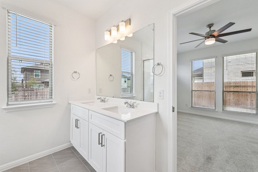 Furnished interior view inside a new home in Crosswinds, Kyle (Image 10).