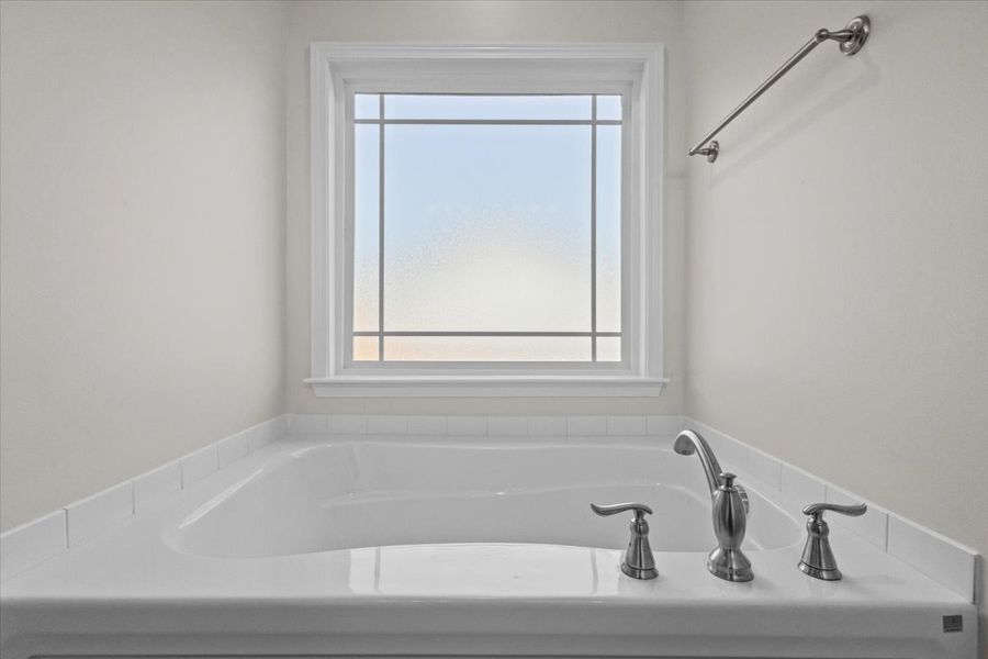 Representative interior finishes for a home built from the Morgan by Enchanted Homes in Lonesome Dove, San Antonio (Image 14).