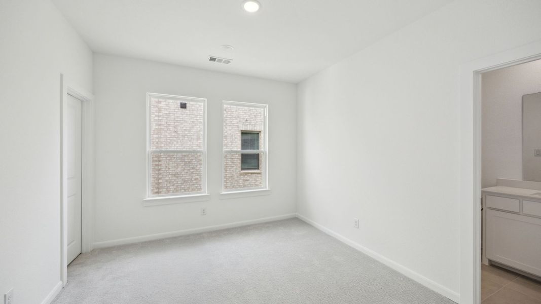Representative unfurnished interior of a home built from the Royale II by Normandy Homes in Village on Main Street, Frisco (Image 13).