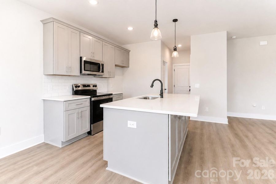 Furnished interior view inside a new home in , Statesville (Image 12).