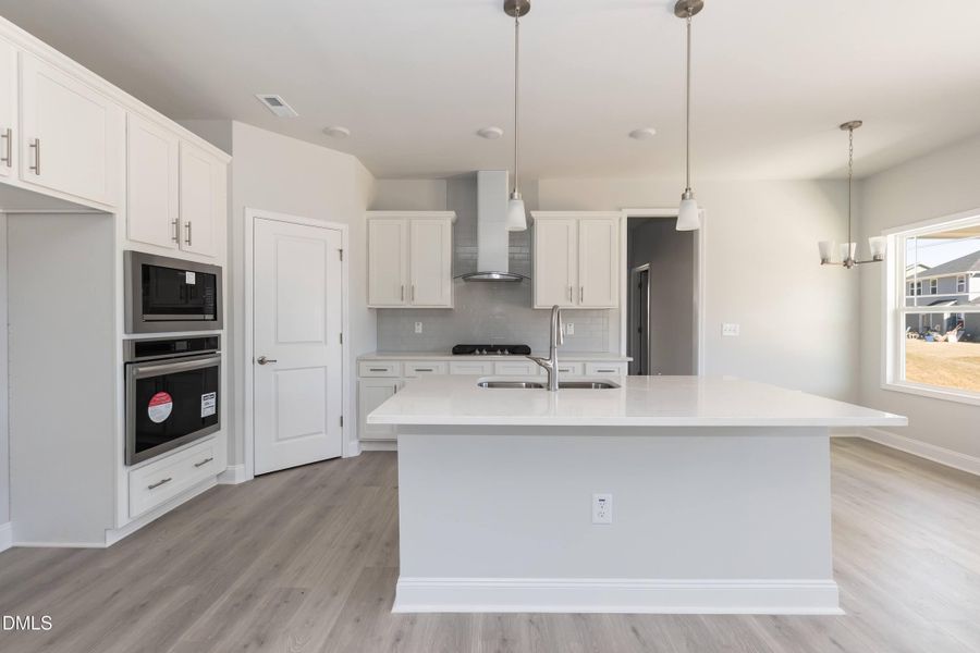 Furnished interior view inside a new home in Hidden Pines, Cameron (Image 4).