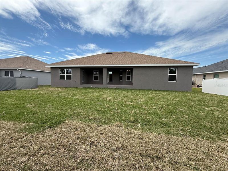 Front exterior of a new home in South Gulf Cove, Port Charlotte, FL, highlighting curb appeal (Image 2).
