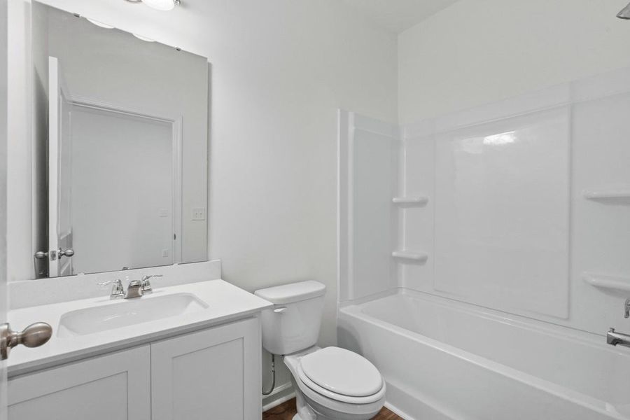 Furnished interior view inside a new home in Willow Springs, Buda (Image 8).