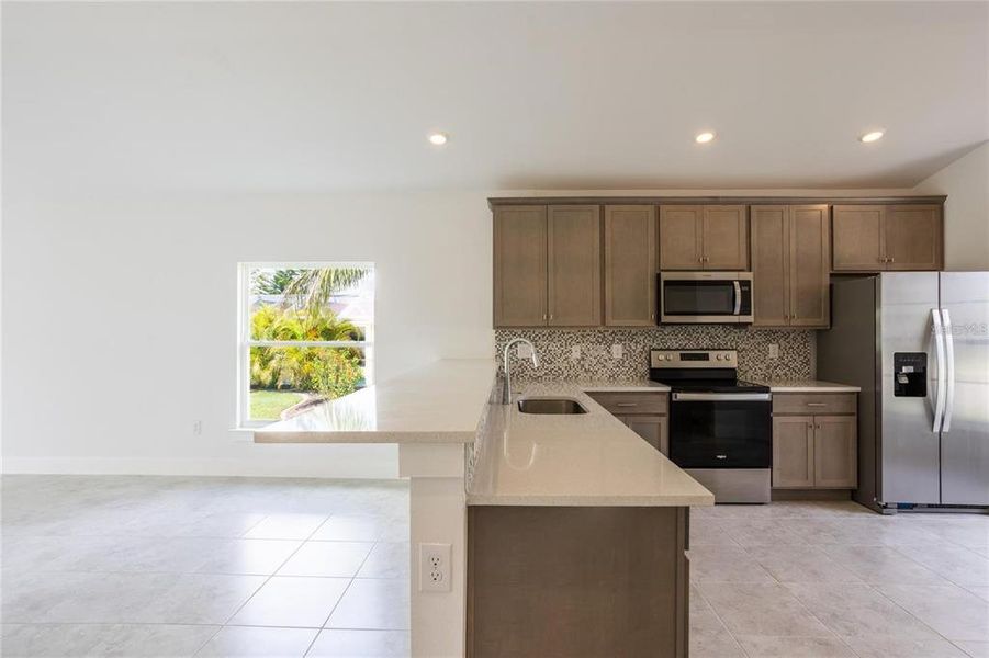 Furnished interior view inside a new home in , Port Charlotte (Image 6).