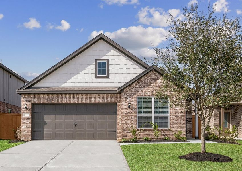 Exterior of the Victoria with a two-car garage Exterior of the Victoria with a two-car garage