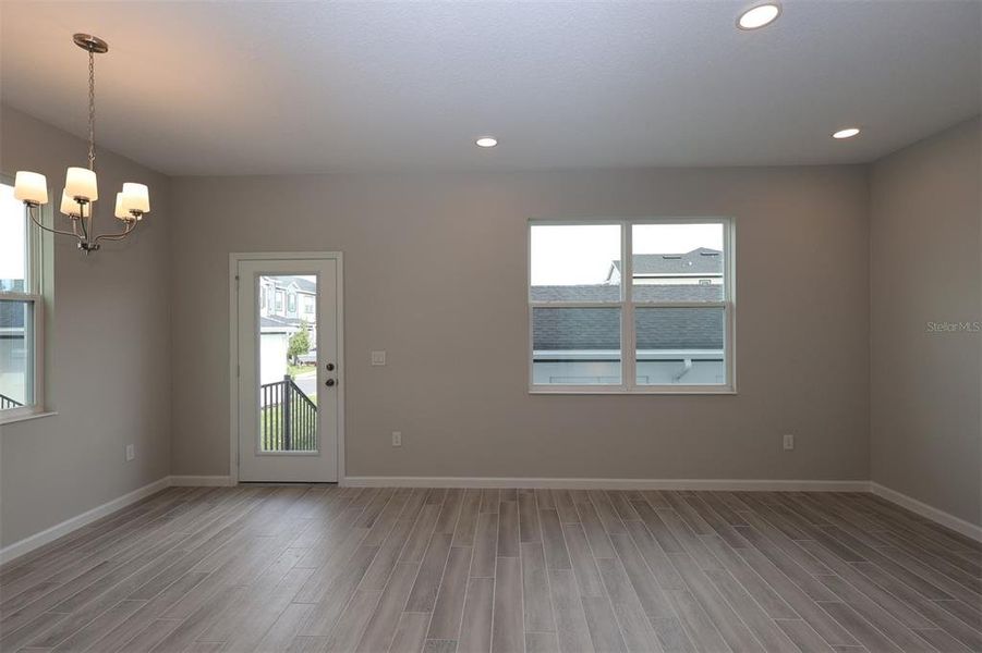 Spacious, unfurnished interior of a new home in Tribute at Ovation, Winter Garden (Image 19).