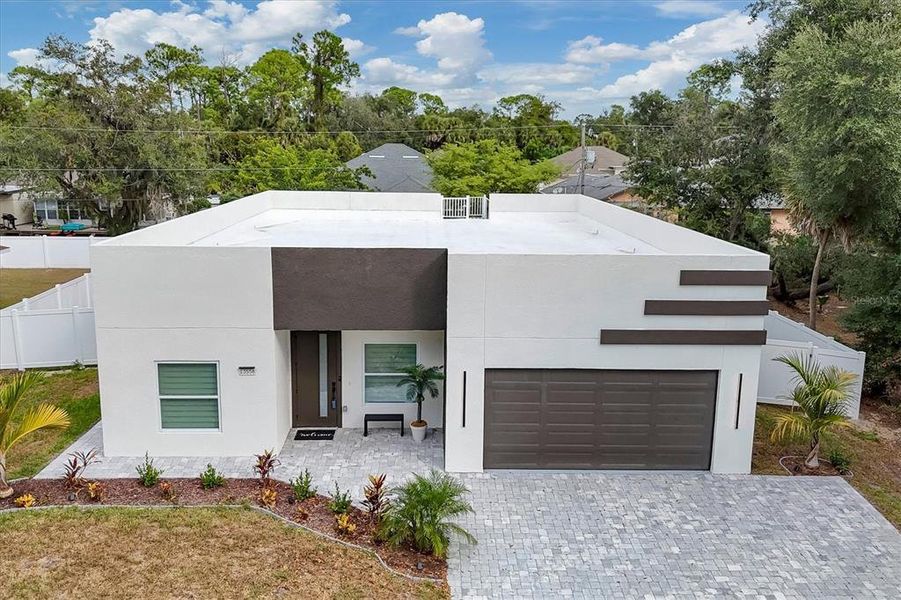 Front exterior of a new home in , Port Charlotte, FL, highlighting curb appeal (Image 18).
