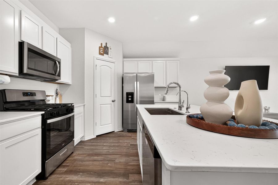 Furnished interior view inside a new home in Sunterra, Katy (Image 17).