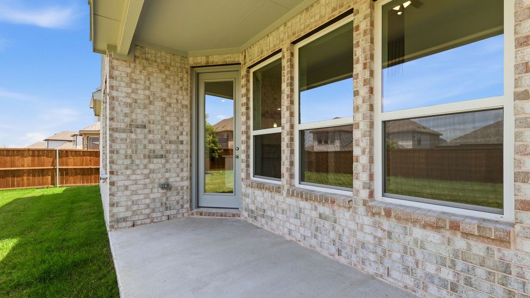 Exterior details and patio area of a home in Anna Ranch, Anna (Image 22).