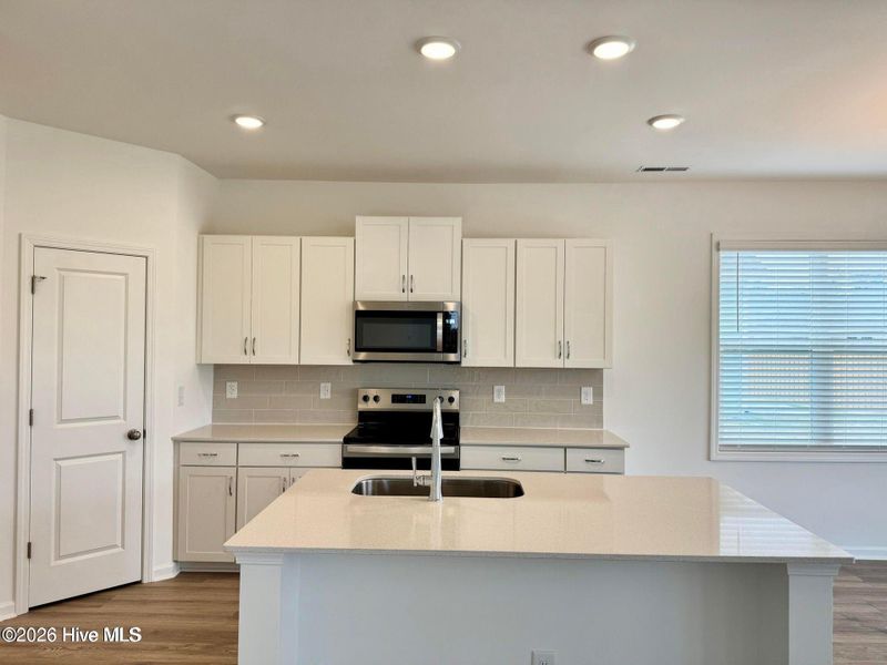 Furnished interior view inside a new home in Coastal Haven, Leland (Image 4).