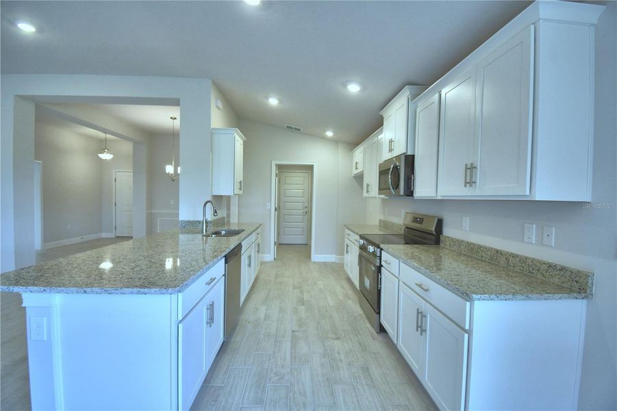 Furnished interior view inside a new home in Lake Juliana Estates, Auburndale (Image 9).