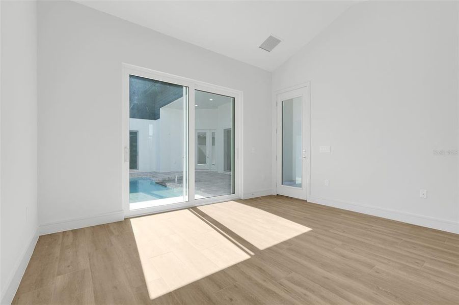 Spacious, unfurnished interior of a new home in Hampton Green at Providence, Davenport (Image 50).