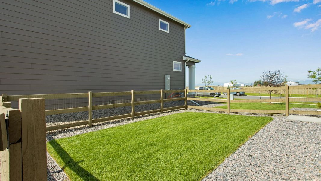 Representative exterior photo of a completed home built from the NEW HAVEN by D.R. Horton in Tailholt, Severance, CO (Image 2).