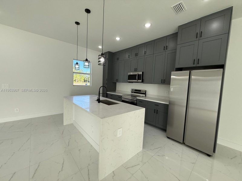 Furnished interior view inside a new home in , Lehigh Acres (Image 3). Furnished interior view inside a new home in , Lehigh Acres (Image 3).