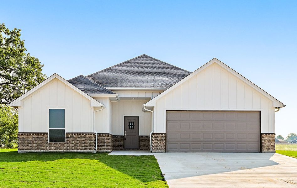 Representative exterior photo of a completed home built from the The Granger by Doug Parr Custom Homes in Fair Oaks, Runaway Bay, TX (Image 2). Representative exterior photo of a completed home built from the The Granger by Doug Parr Custom Homes in Fair Oaks, Runaway Bay, TX (Image 2).
