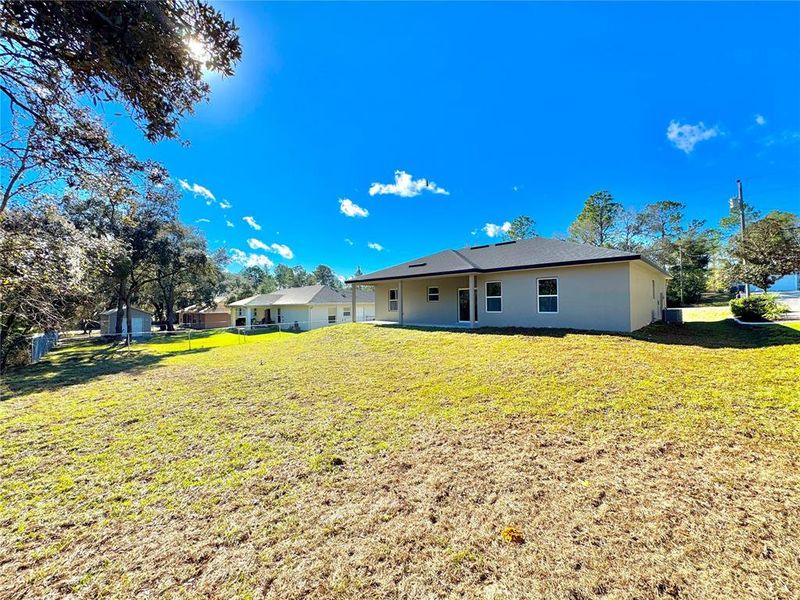 Exterior details and patio area of a home in , Citrus Springs (Image 17).